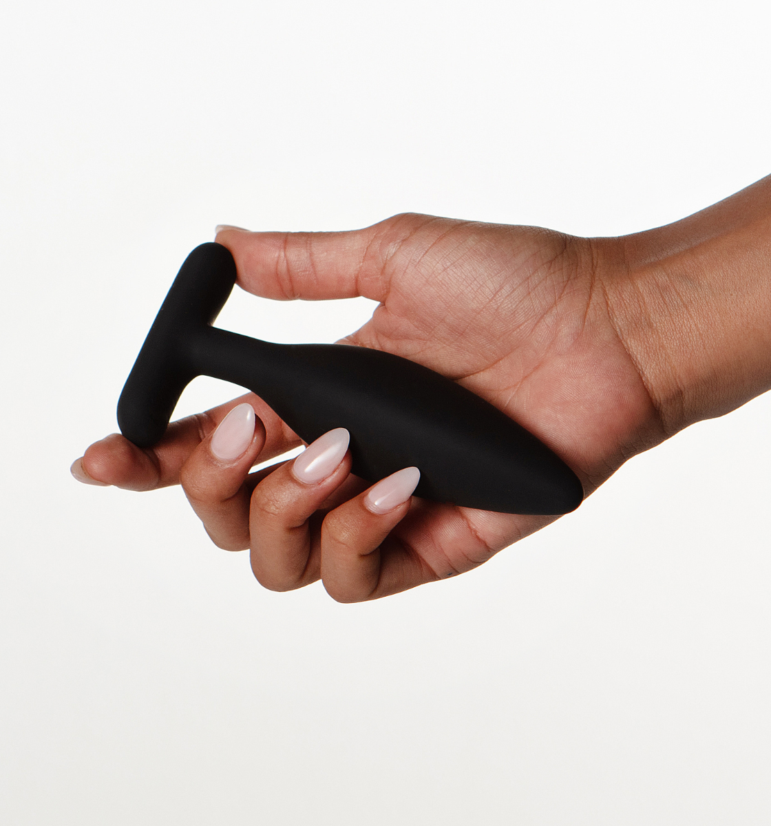 Hand holding Egon but plug