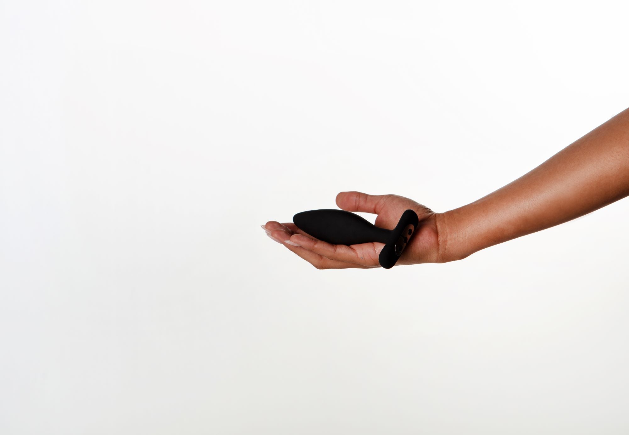 Hand holding Vesta Butt Plug