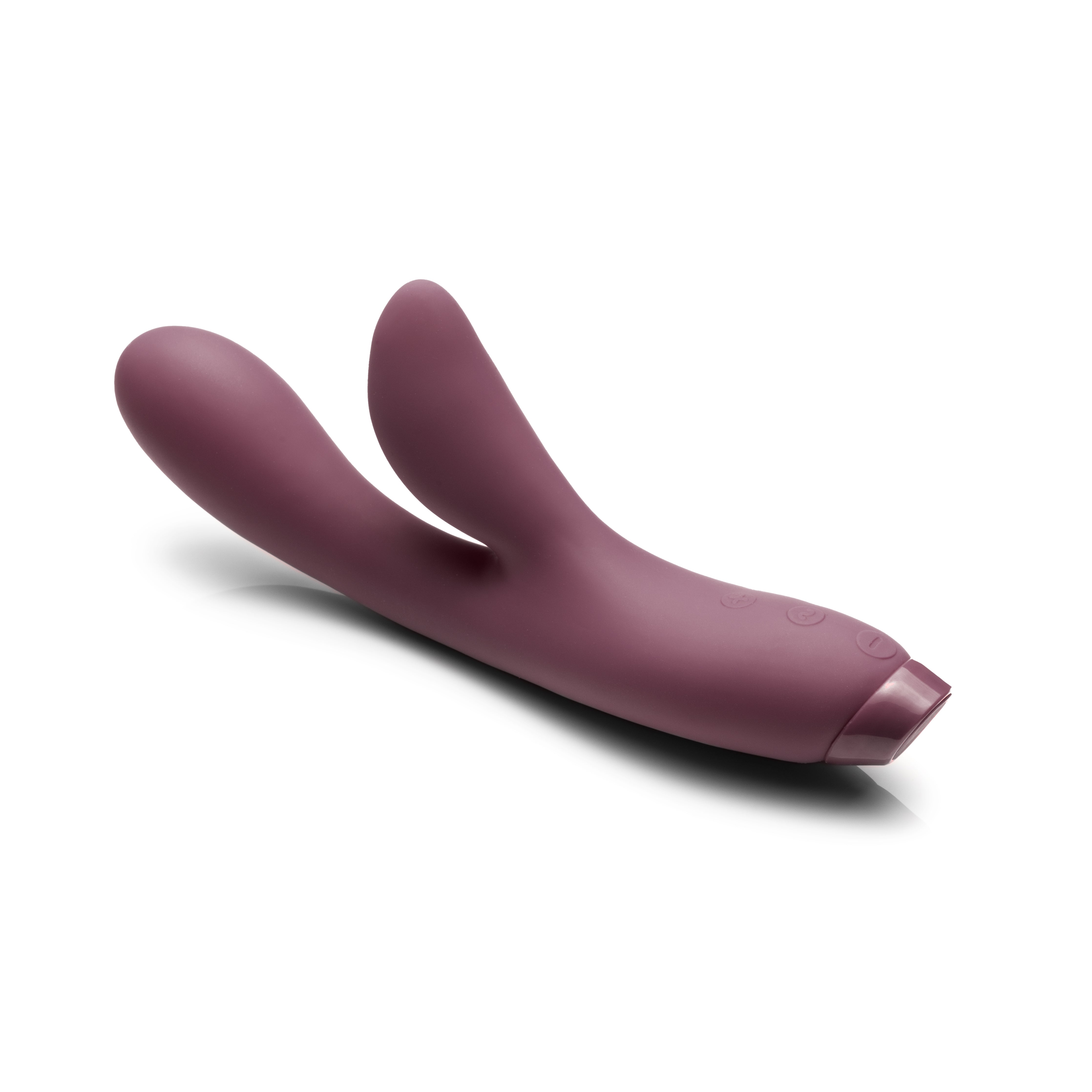 Purple Hera vibrator lying on white background