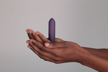 Hands holding Je Joue Classic Bullet Vibrator