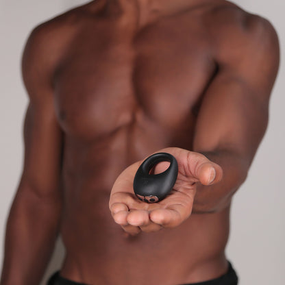 Man holding Mio Vibrating Cock Ring