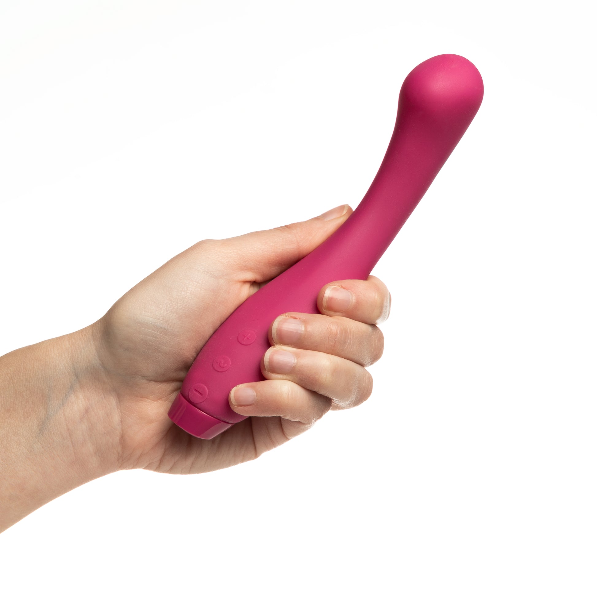 Pink Juno Vibrator in hand on white background